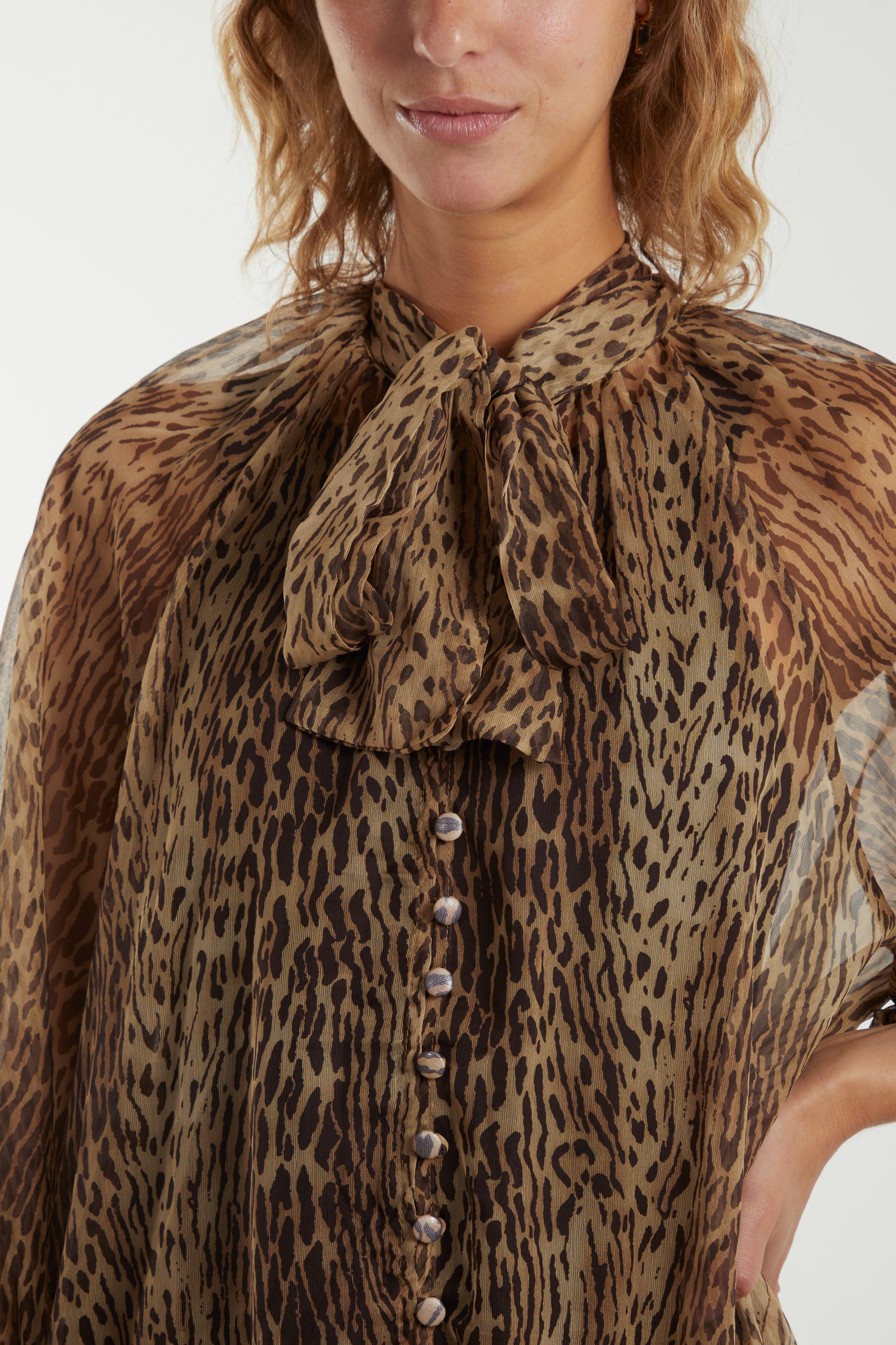 Leopard Print Sheer Frilled Hem Top