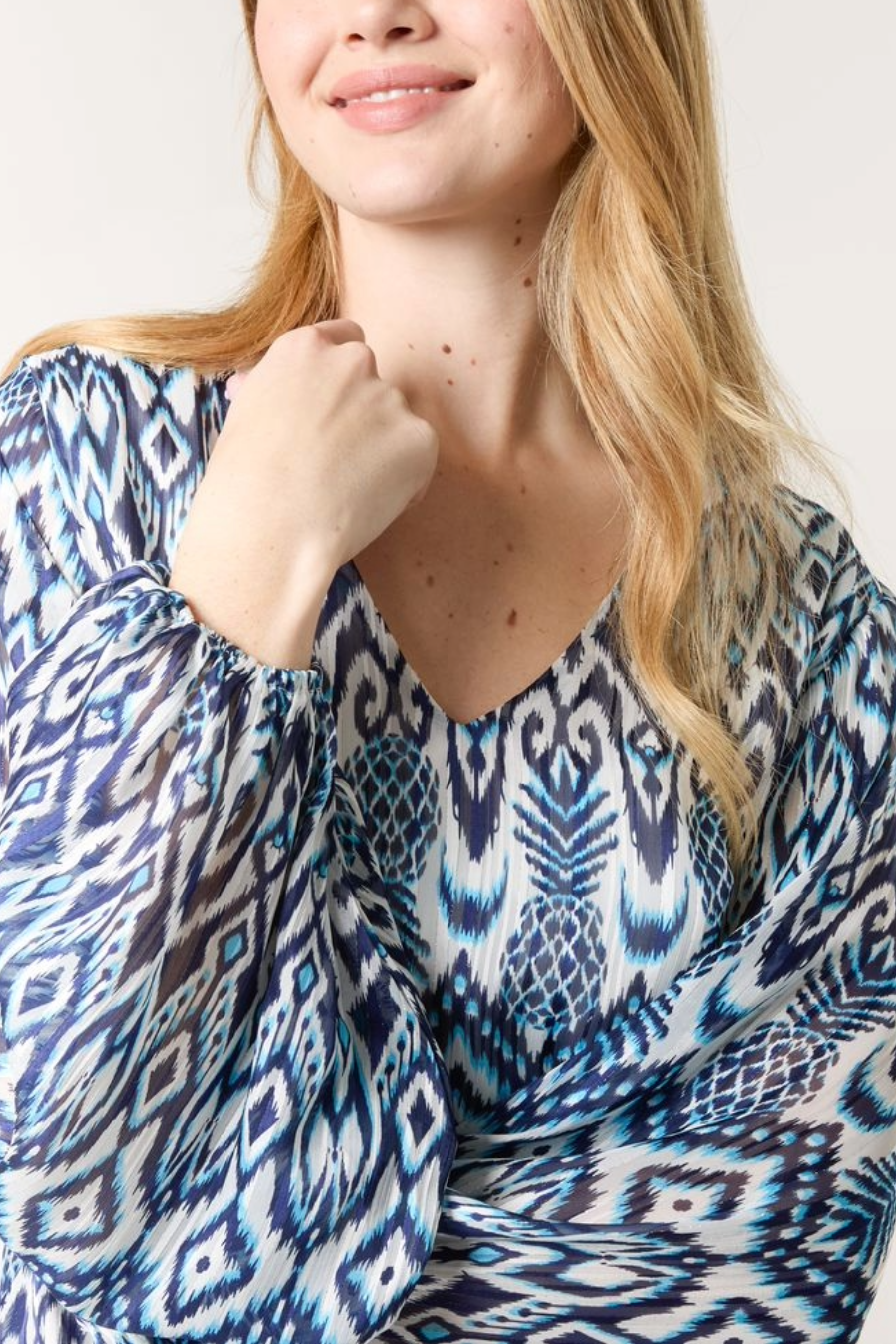 Aztec Print V-Neck Puffball Blouse