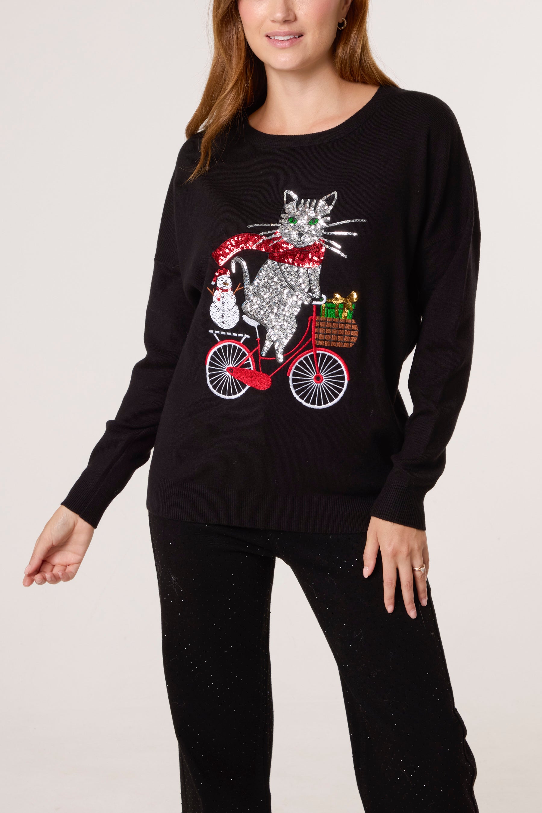 Sequin Cat On A Bike Christmas Jumper
