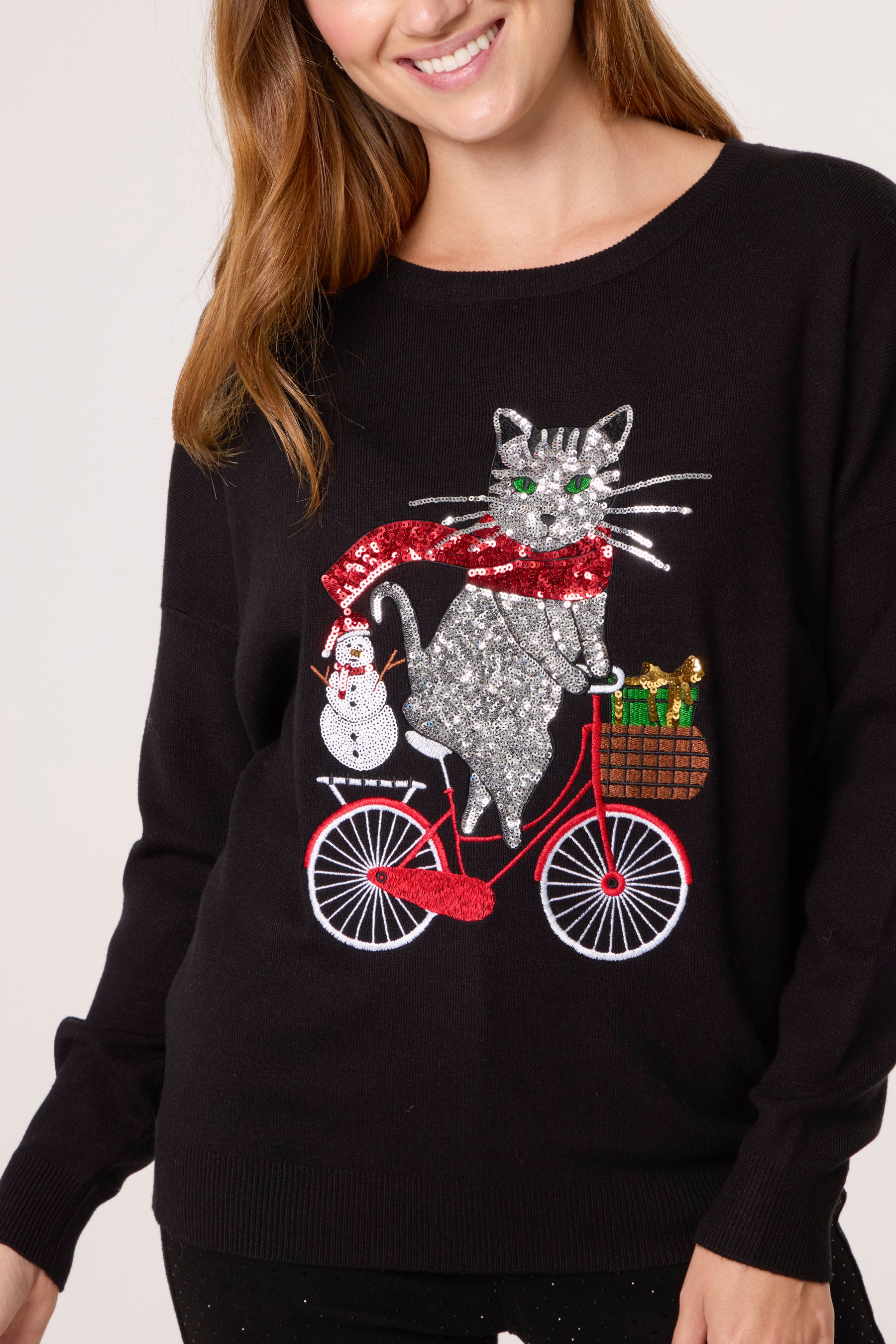 Sequin Cat On A Bike Christmas Jumper