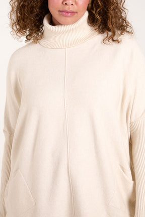 Roll Neck Pocket Asymmetric Jumper