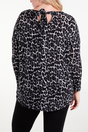 Animal Print Long Sleeve Bow Back Top