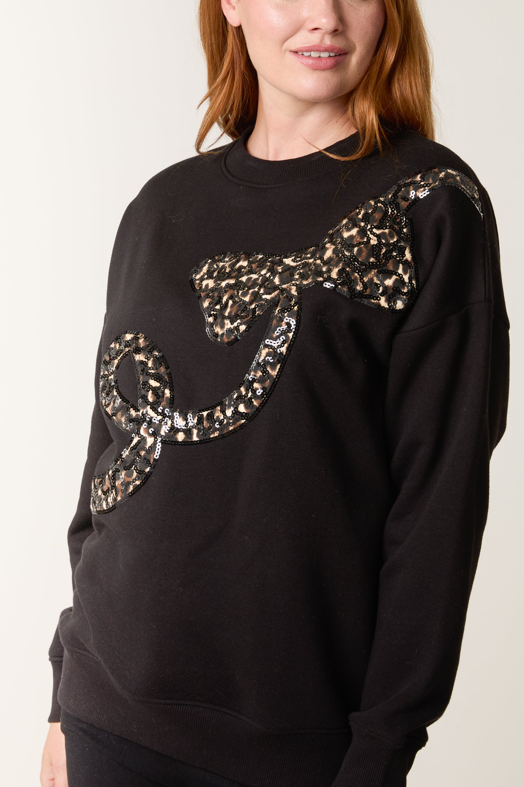 Sequin Animal Print Bow Sweatshirt
