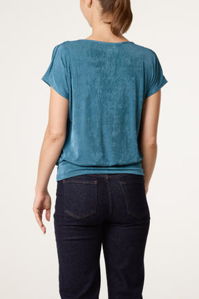 Metallic Draped Cowl Neck Hem Top