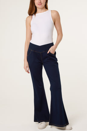 Flared Cross Over Waistband Jeans