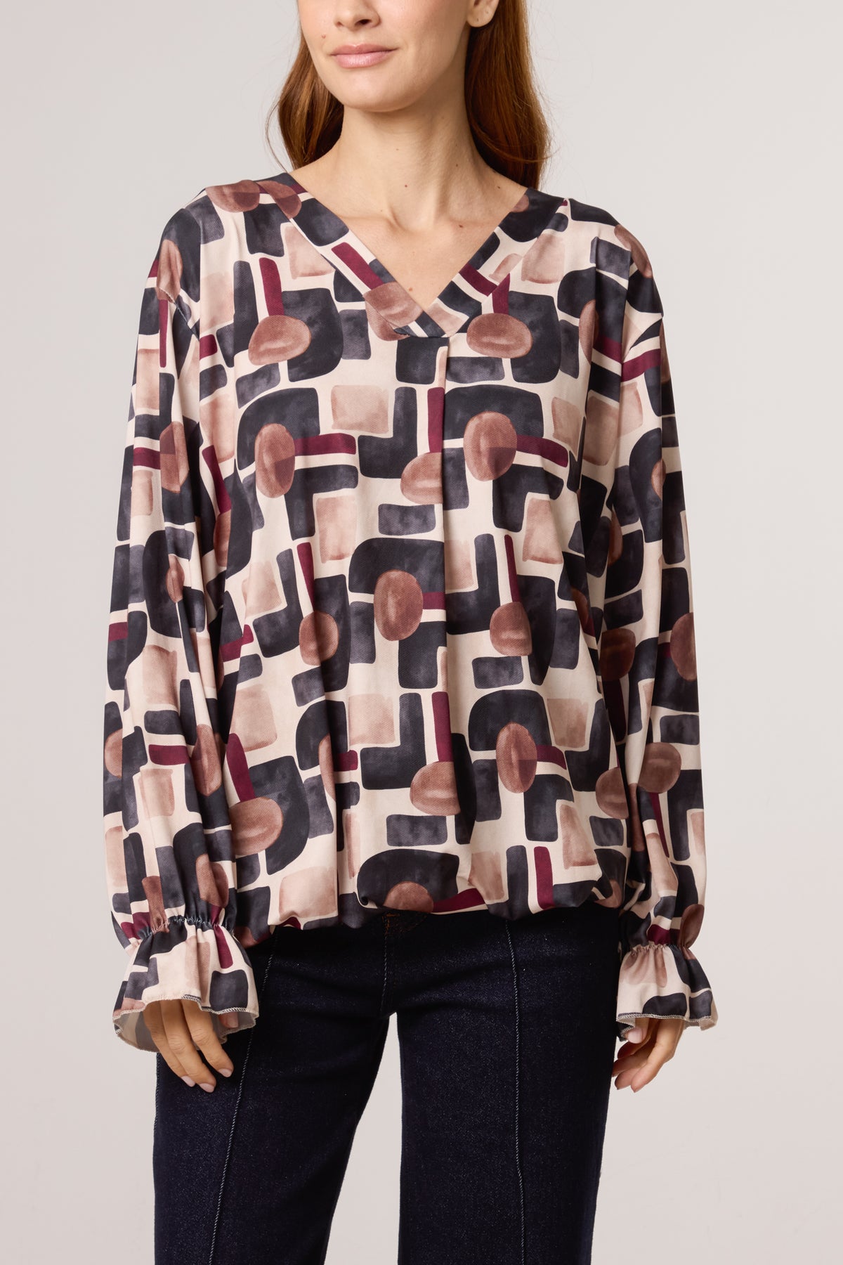 Geometric Bubble Hem Jersey Blouse