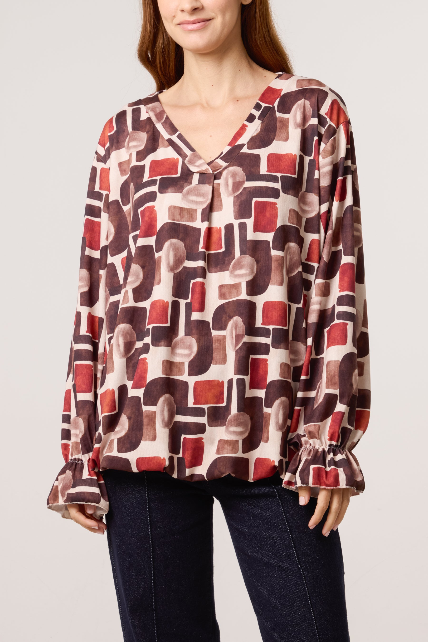 Geometric Bubble Hem Jersey Blouse