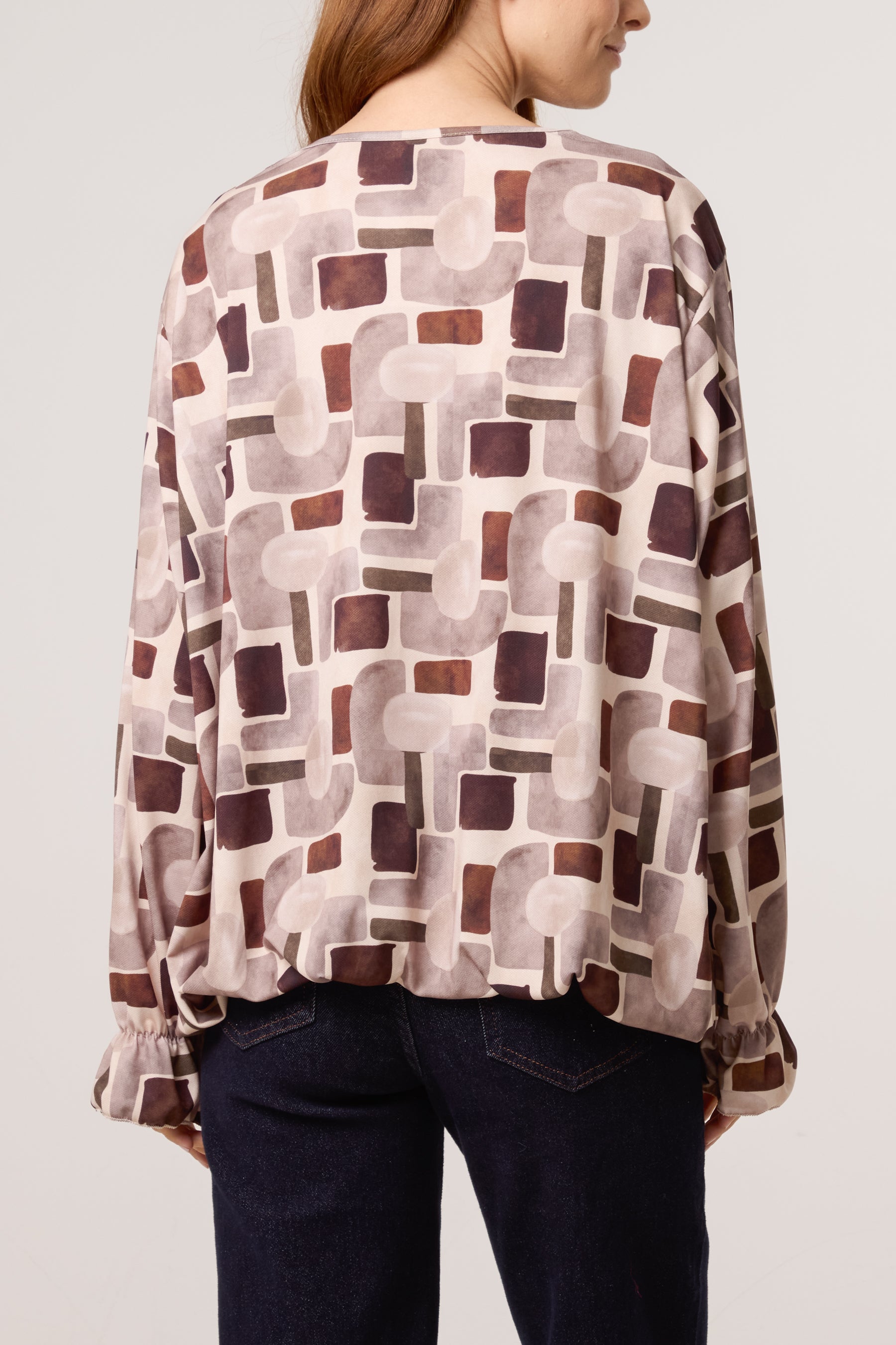 Geometric Bubble Hem Jersey Blouse