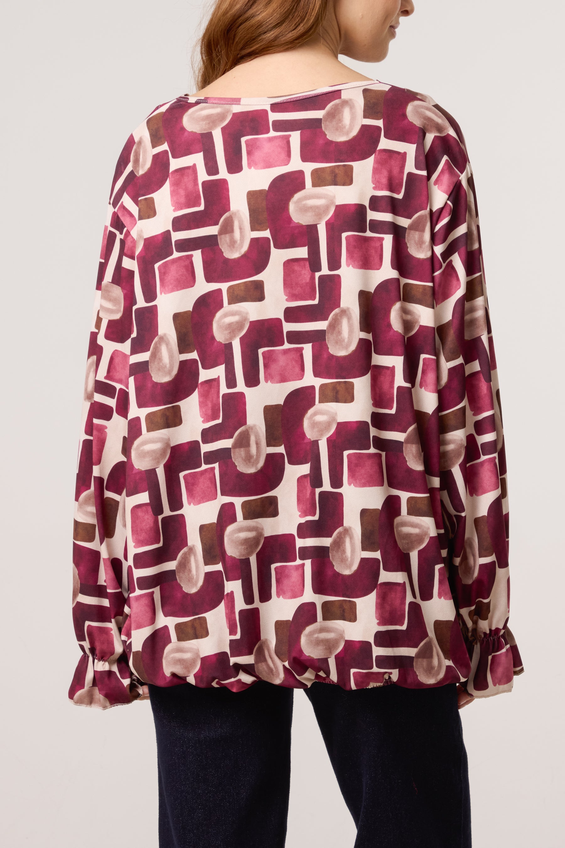 Geometric Bubble Hem Jersey Blouse