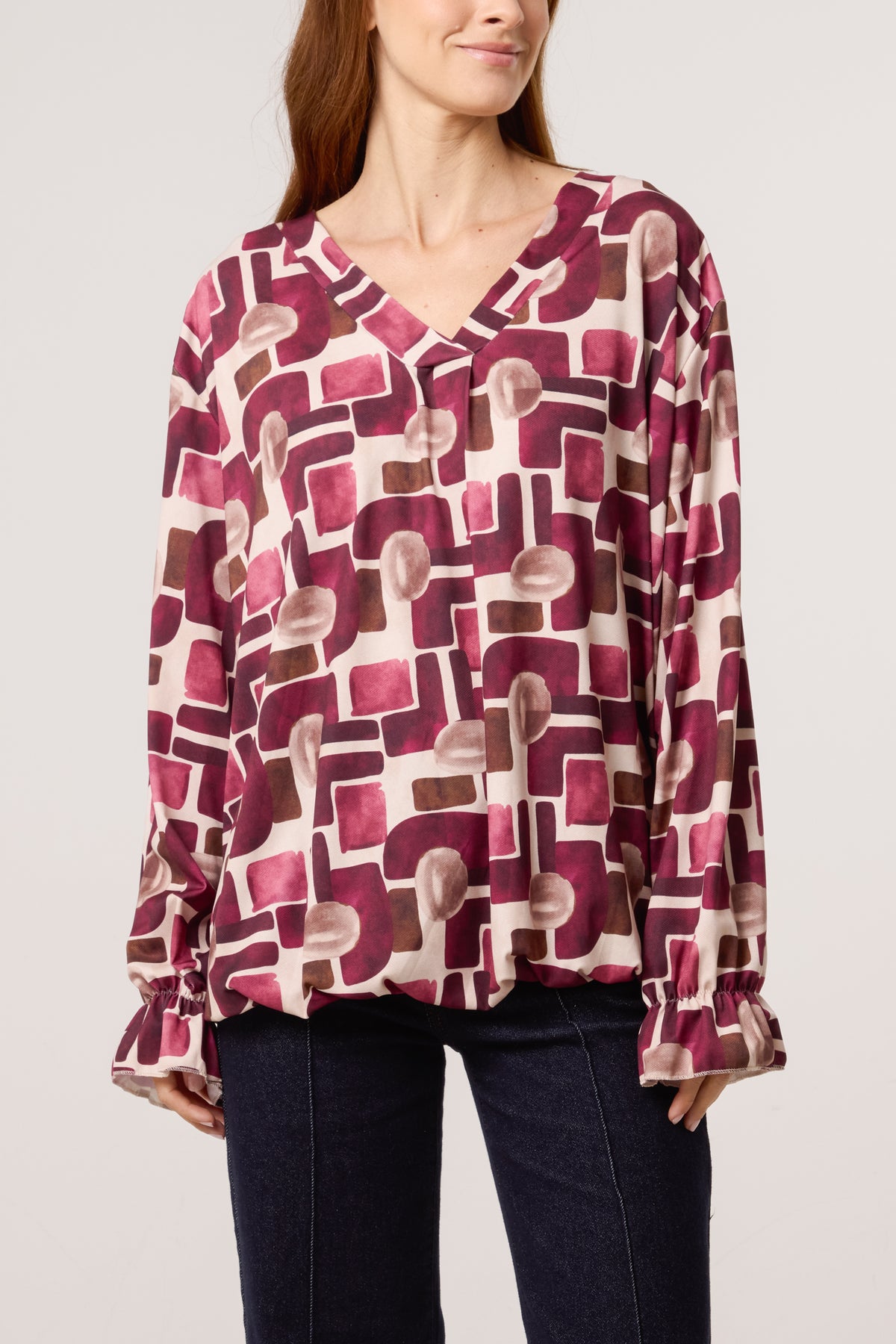 Geometric Bubble Hem Jersey Blouse