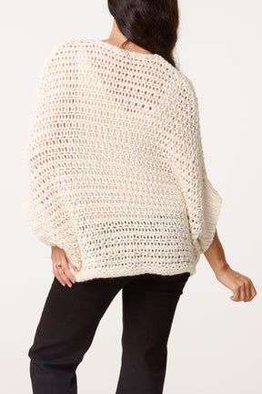 Wrap Over Assymetric Hem Knit Top