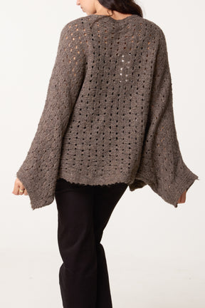 Wrap Over Assymetric Hem Knit Top