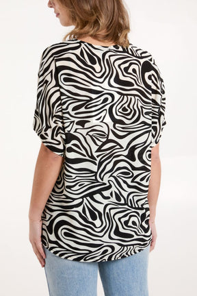 Abstract Swirl Short Sleeve Top