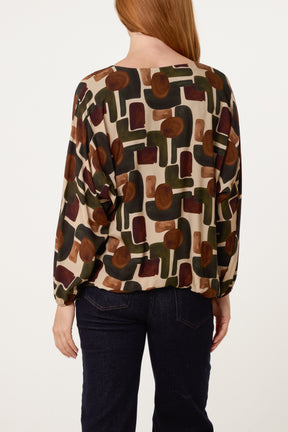 V-Neck Bubble Hem Geometric Blouse
