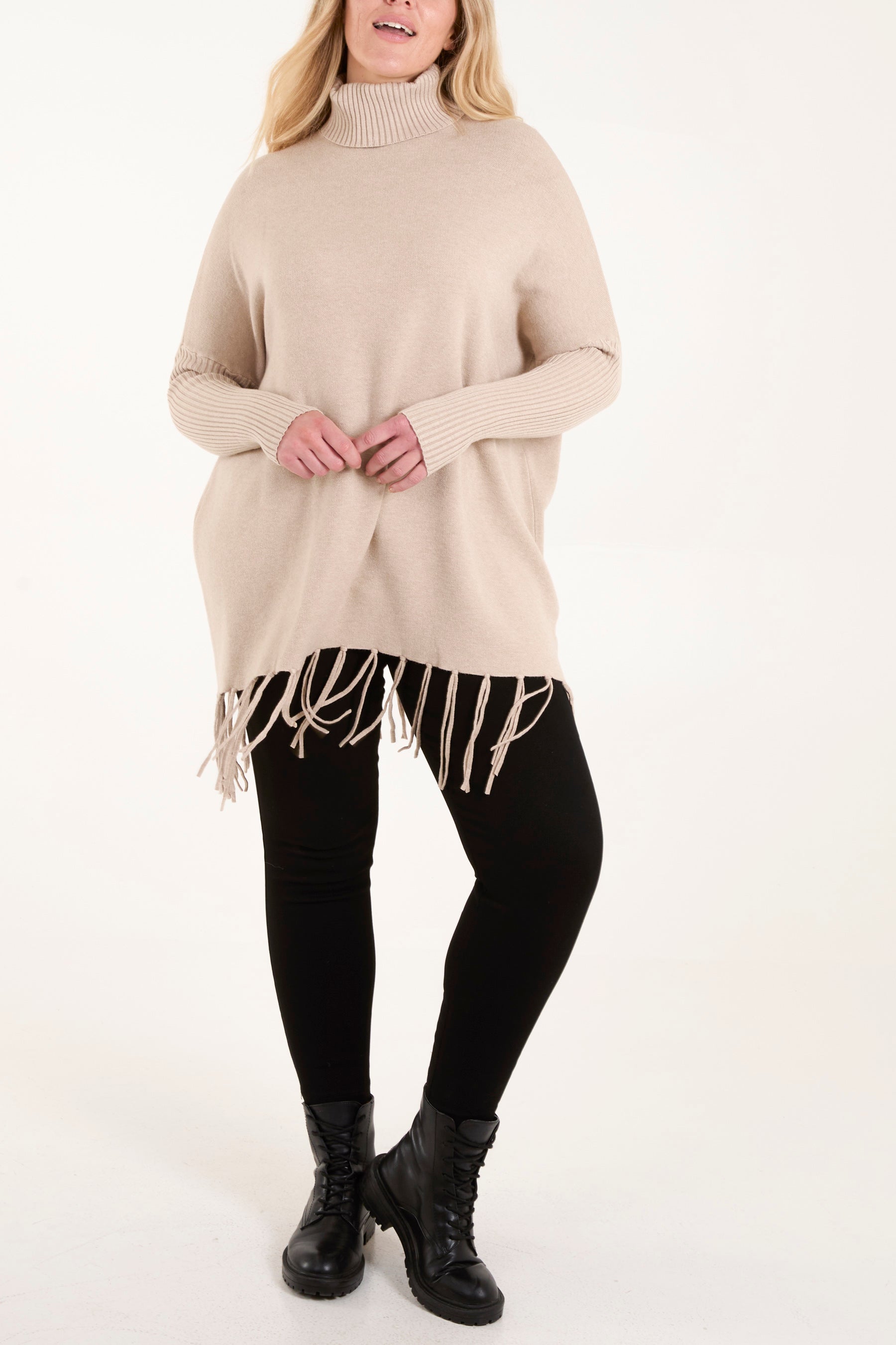 Roll Neck Fringe Hem Jumper