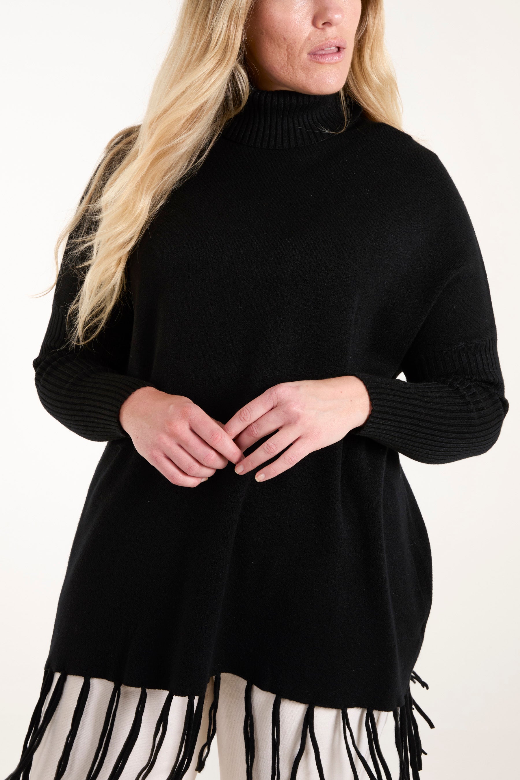 Roll Neck Fringe Hem Jumper