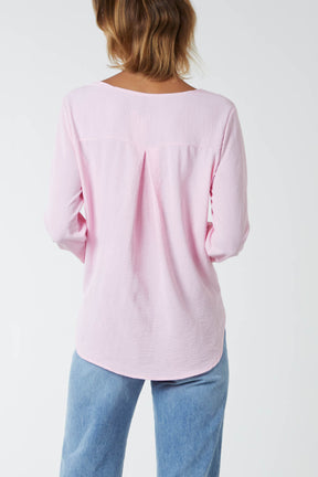 Wrap Front Dip Hem Cuffed Sleeve Blouse